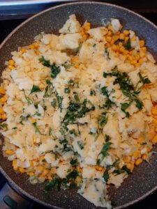 mix the potatoes with corn
